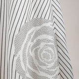 ROSETTE STRIPED VEST WITH SKIRT