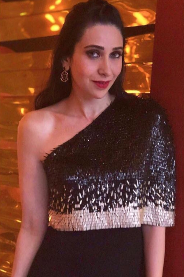 Karishma Kapoor in Black and Gold Asymmetric NJ Signature Sequin Embellished Dress